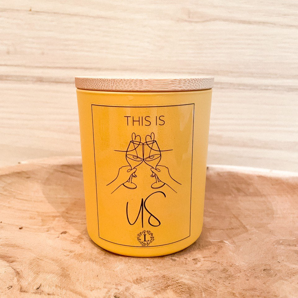 THIS IS US CANDLE YELLOW